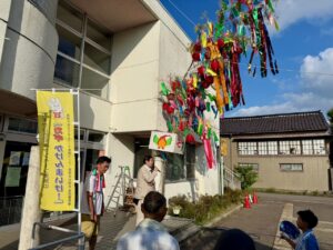 七夕まつりイン平米の点灯式であいさつをされる山﨑連合自治会長